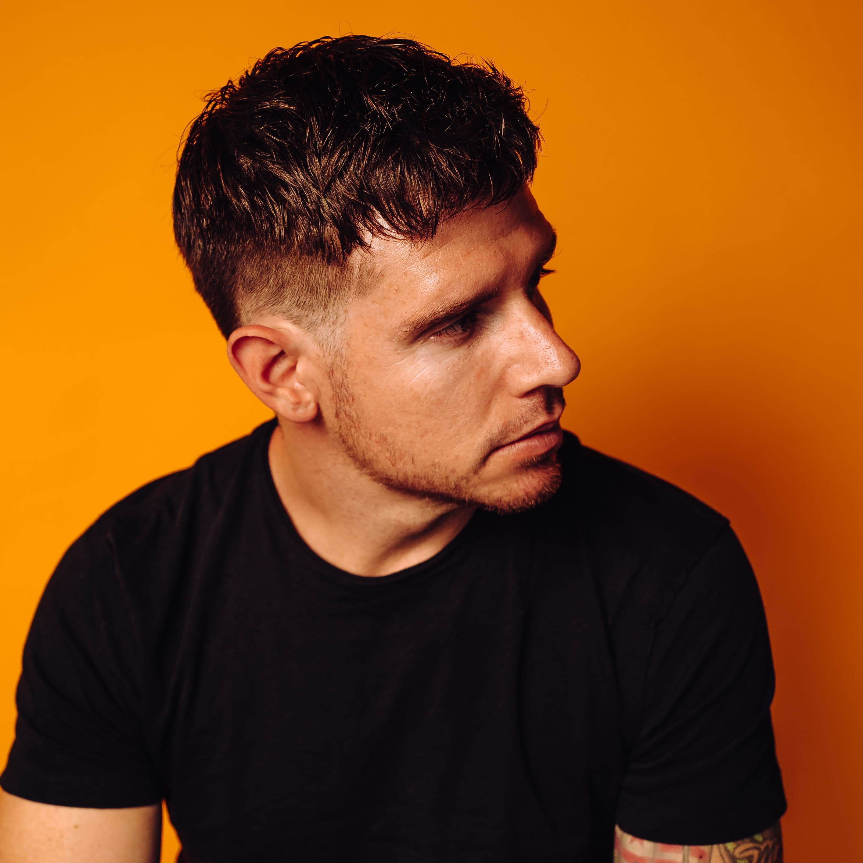 Jordan Sherman looking to the right.